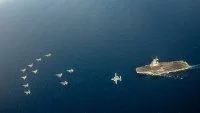 Le Charles de Gaulle survolé par les appareils embarqués et des F16 portugais