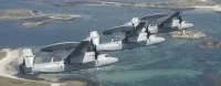 3 Hawkeye volent en formation